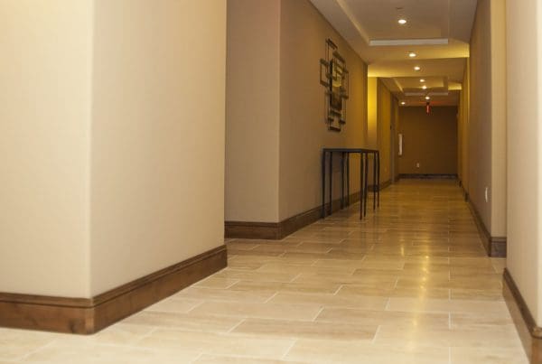 A hallway with freshly painted walls, showcasing its new color and refreshed appearance.